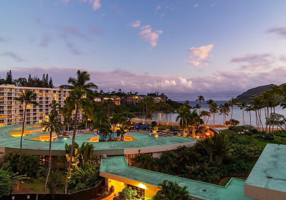 Kalapaki Bay beach club condos at dusk in Lihue, Kauai
